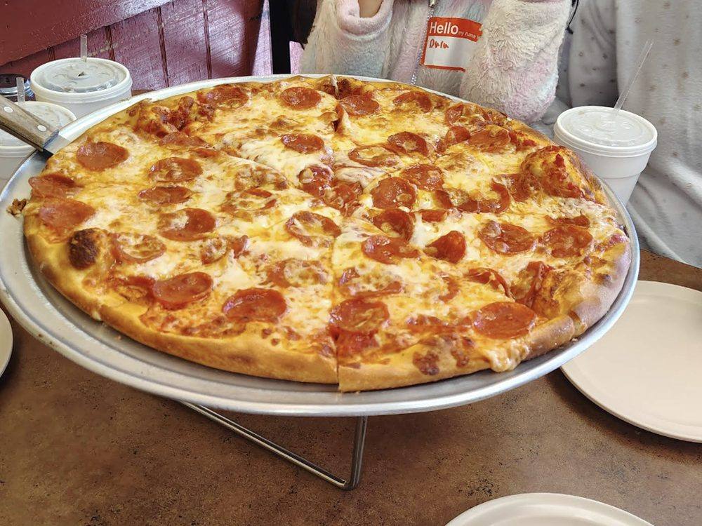 Whole cheese pie on the table